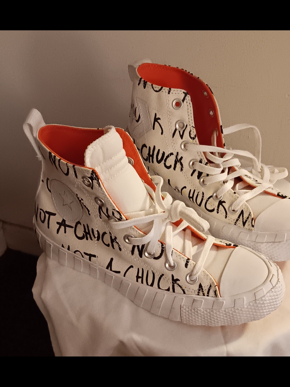 Converse White and Orange High-Top Sneakers with Black Script